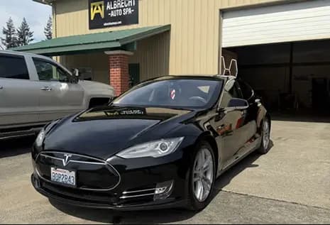 Ceramic coated vehicle with a mirror gloss finish